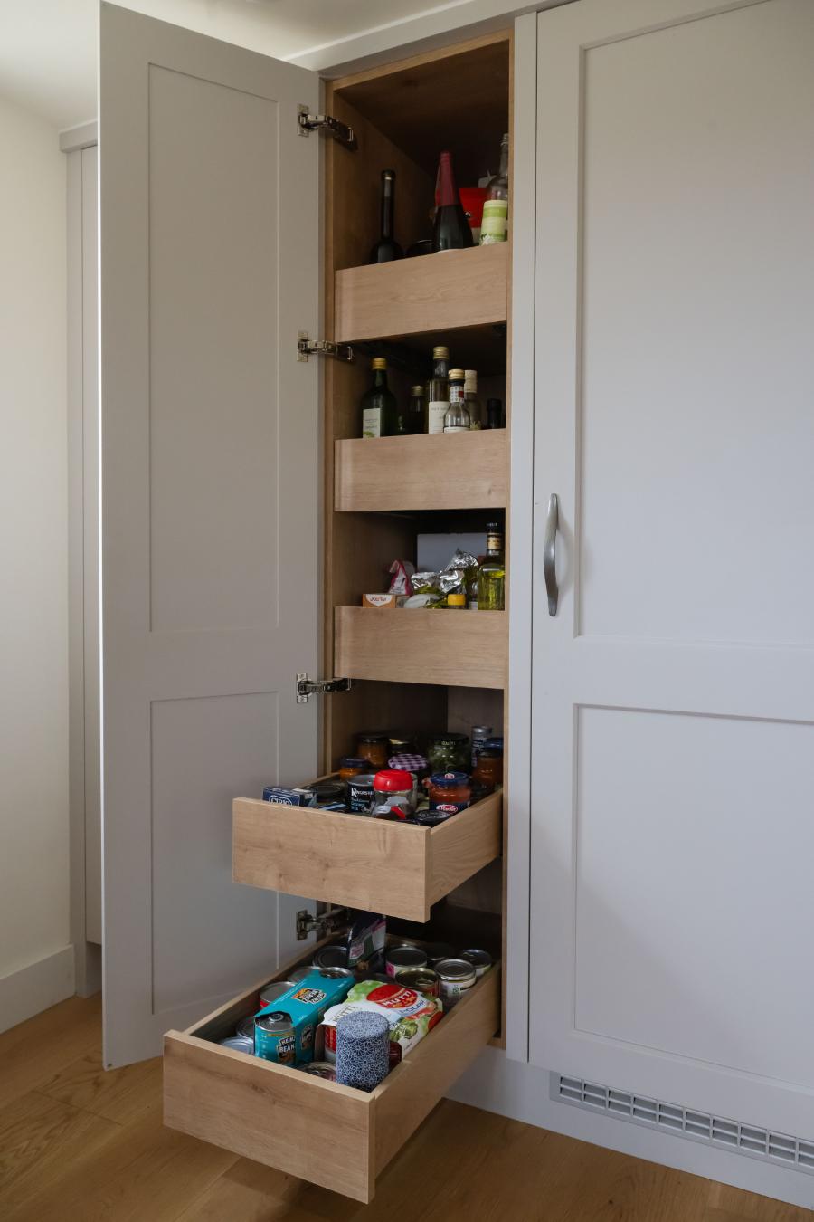A five drawer pull-out pantry by KitchenMakers