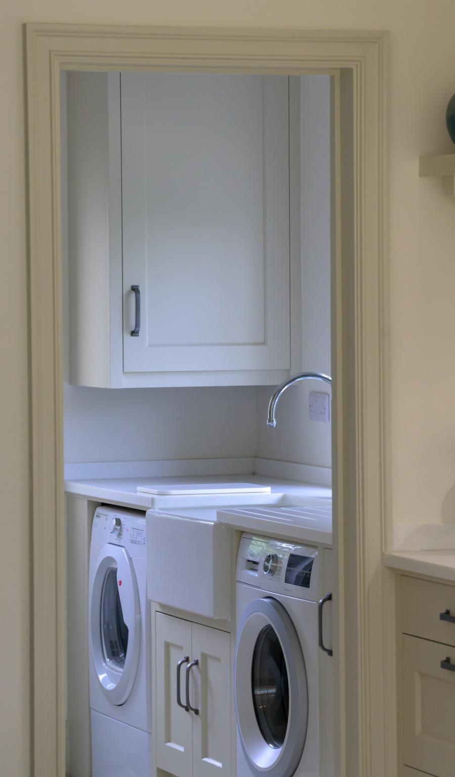 a simple utility room with belfast sink