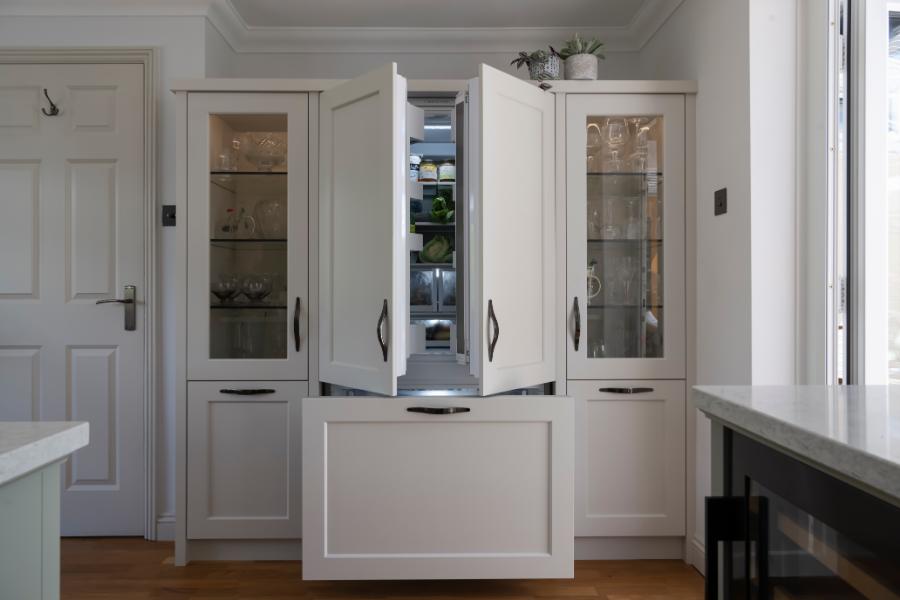 a french door fridge hidden within in a clever dresser unit