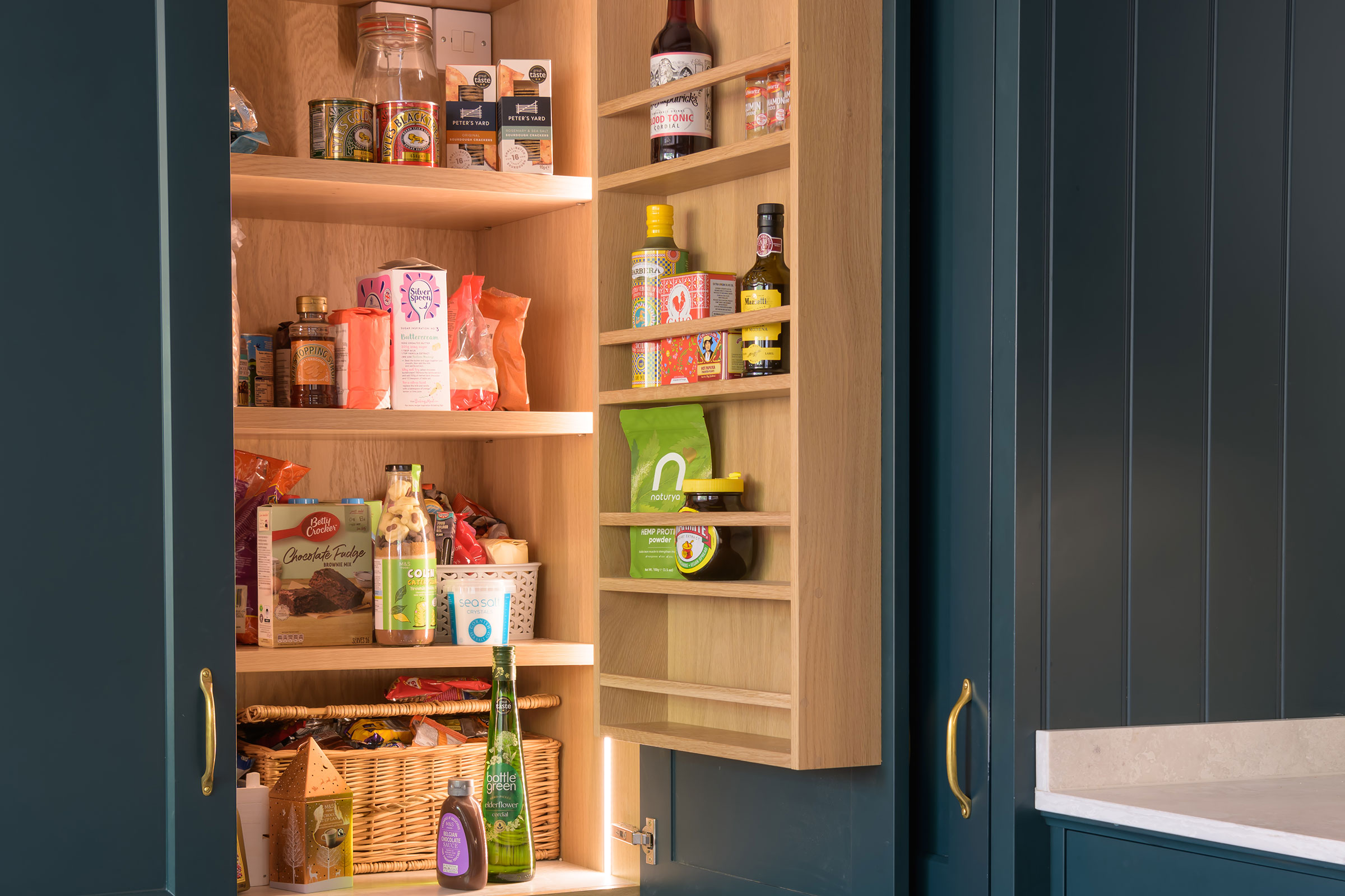 Pantry storage with lighting and door racks