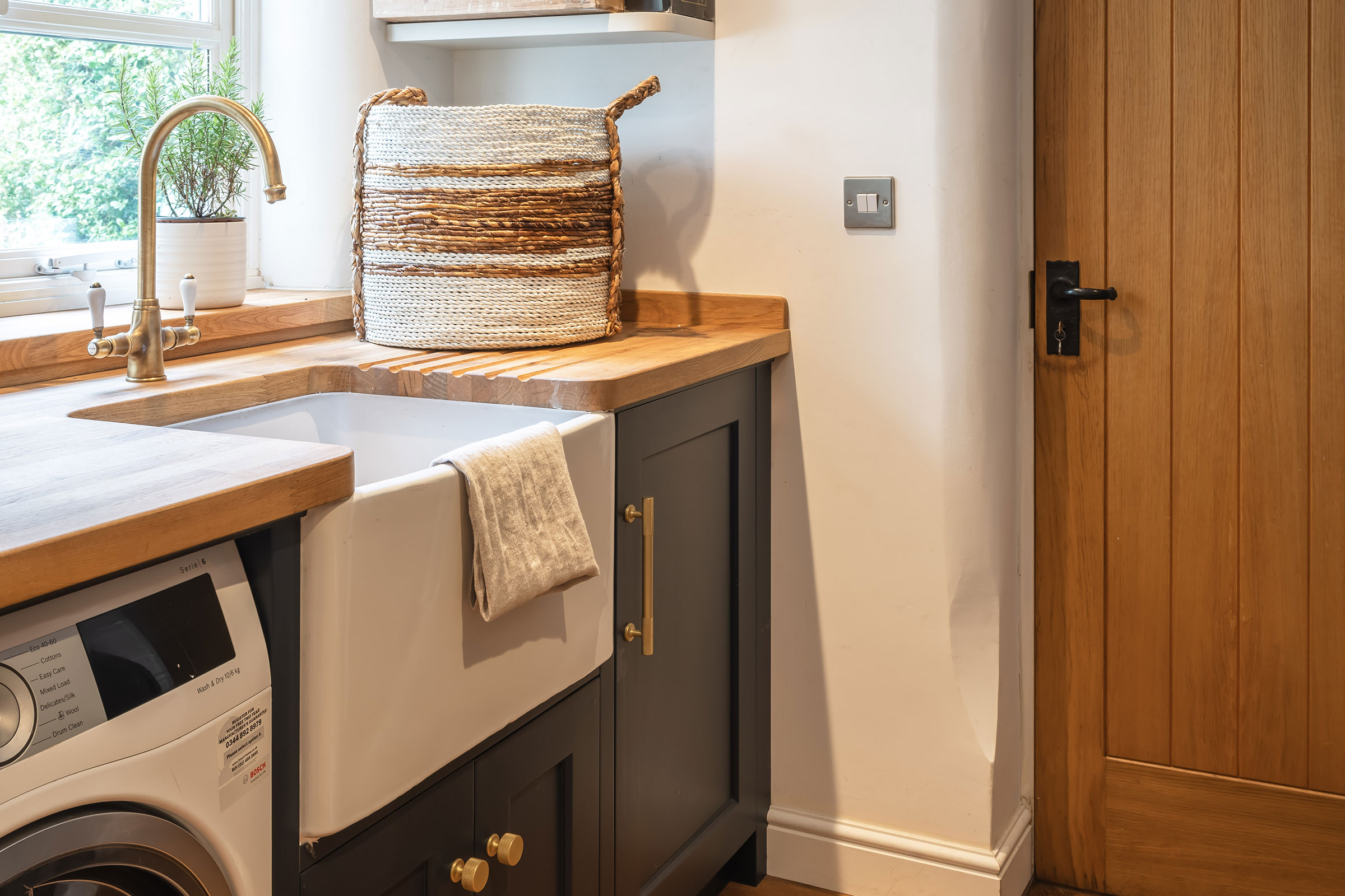 Traditional Utility Room by KitchenMakers