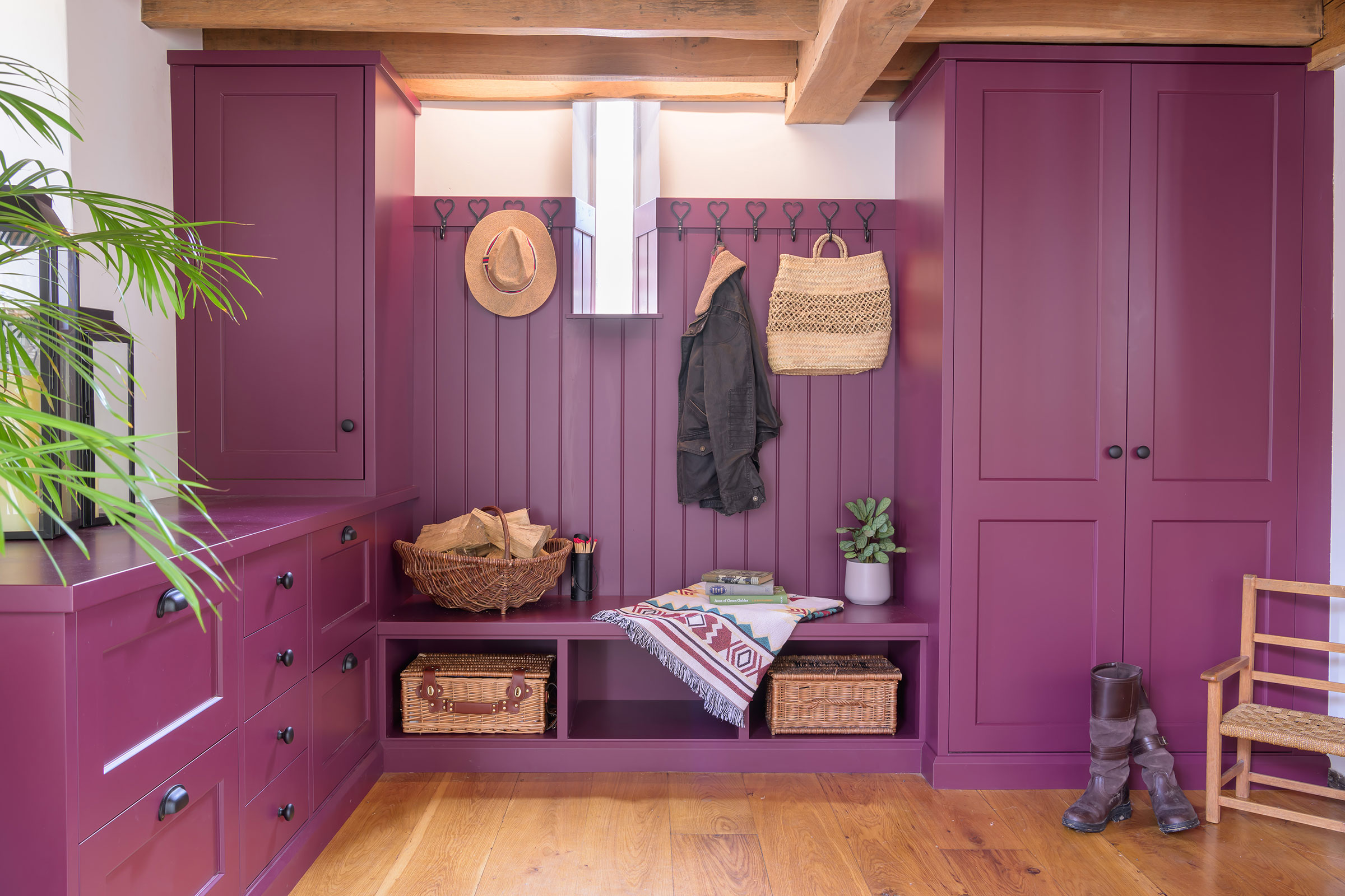 Bespoke bootroom with paint colour matched to a make-up bag burgundy